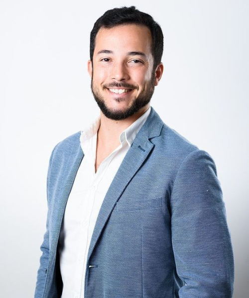 Travel consultant Marcel offering business class booking help